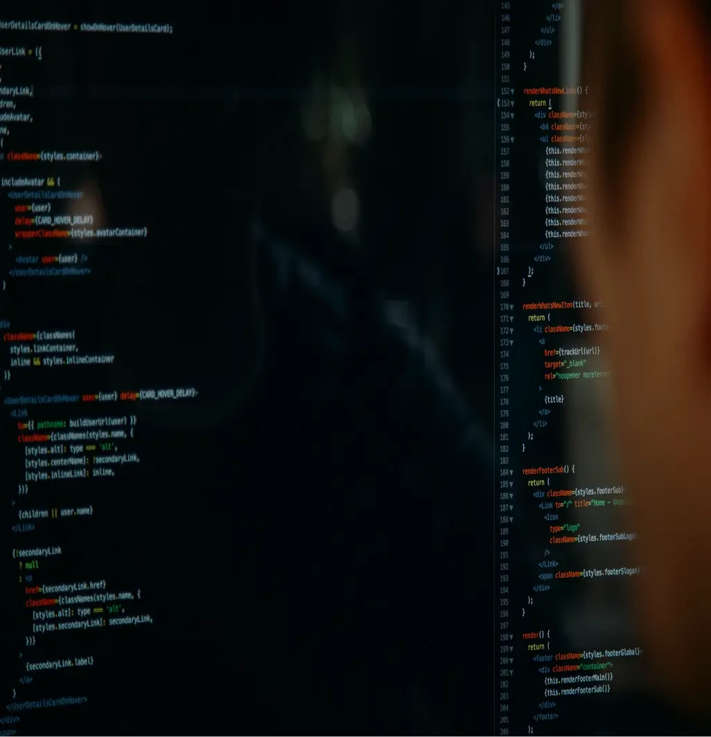A monitor displaying Javascript code