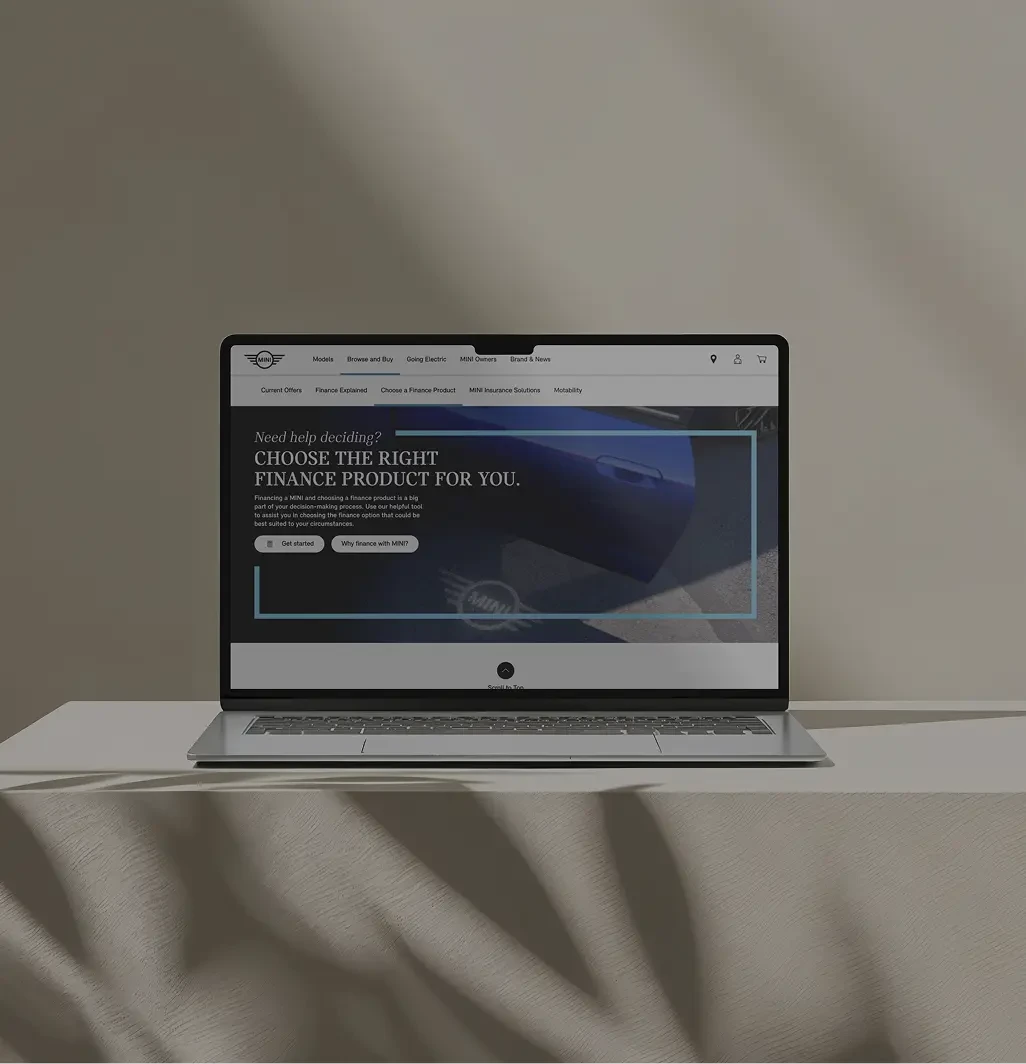 Notebook displaying Mini Cooper landing page.